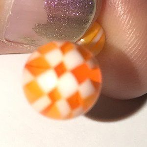 14 Gauge Orange and White Checkerboard Design Belly Ring